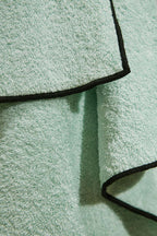 Serviette de bain Overlock | Vert Opaline / Noir