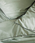 Paire de taies d'oreiller Percale de coton | Vert Amande Liseré Noir